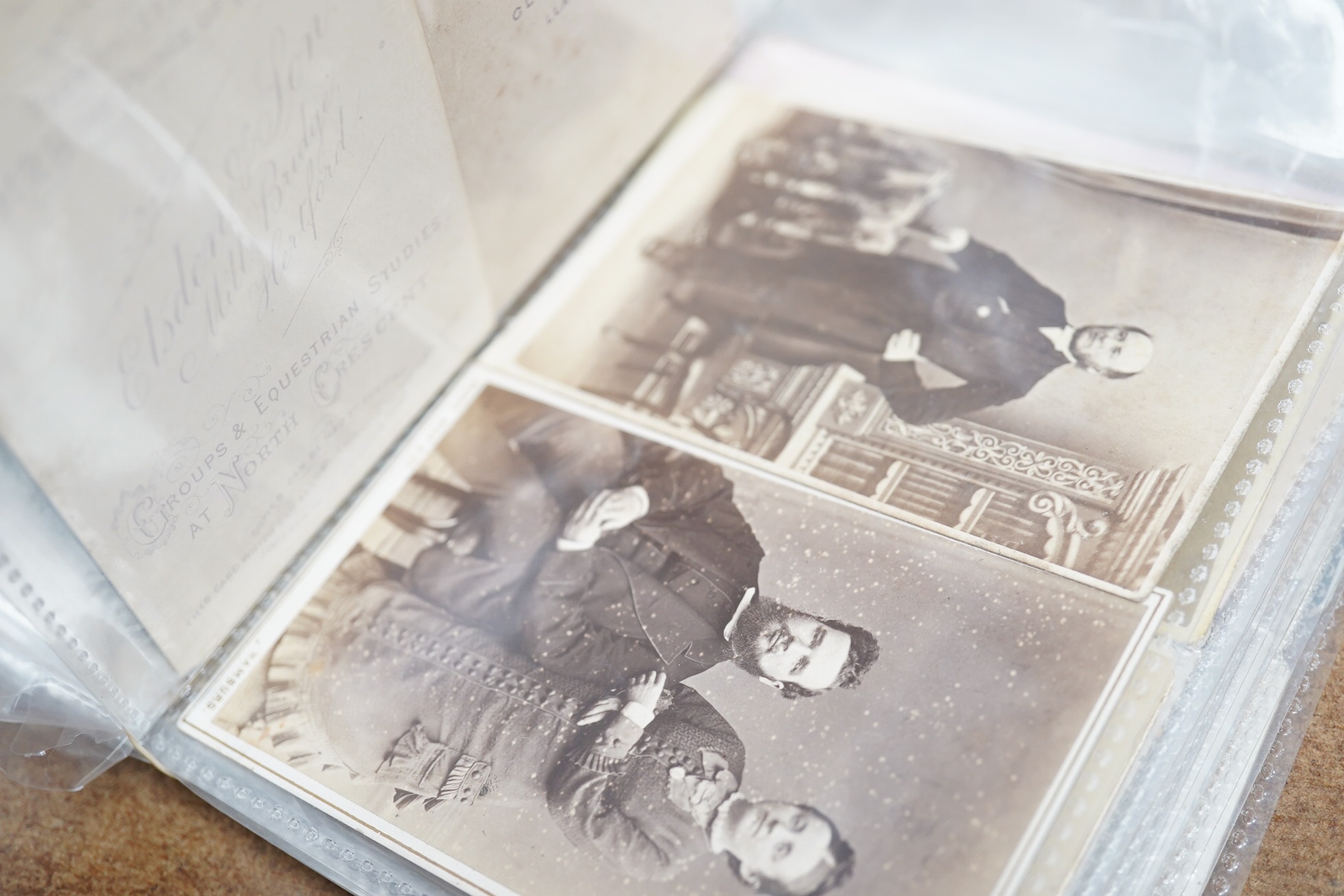 A collection of 19th century carte de visites to include women wearing mourning dress and clergymen. Condition - fair